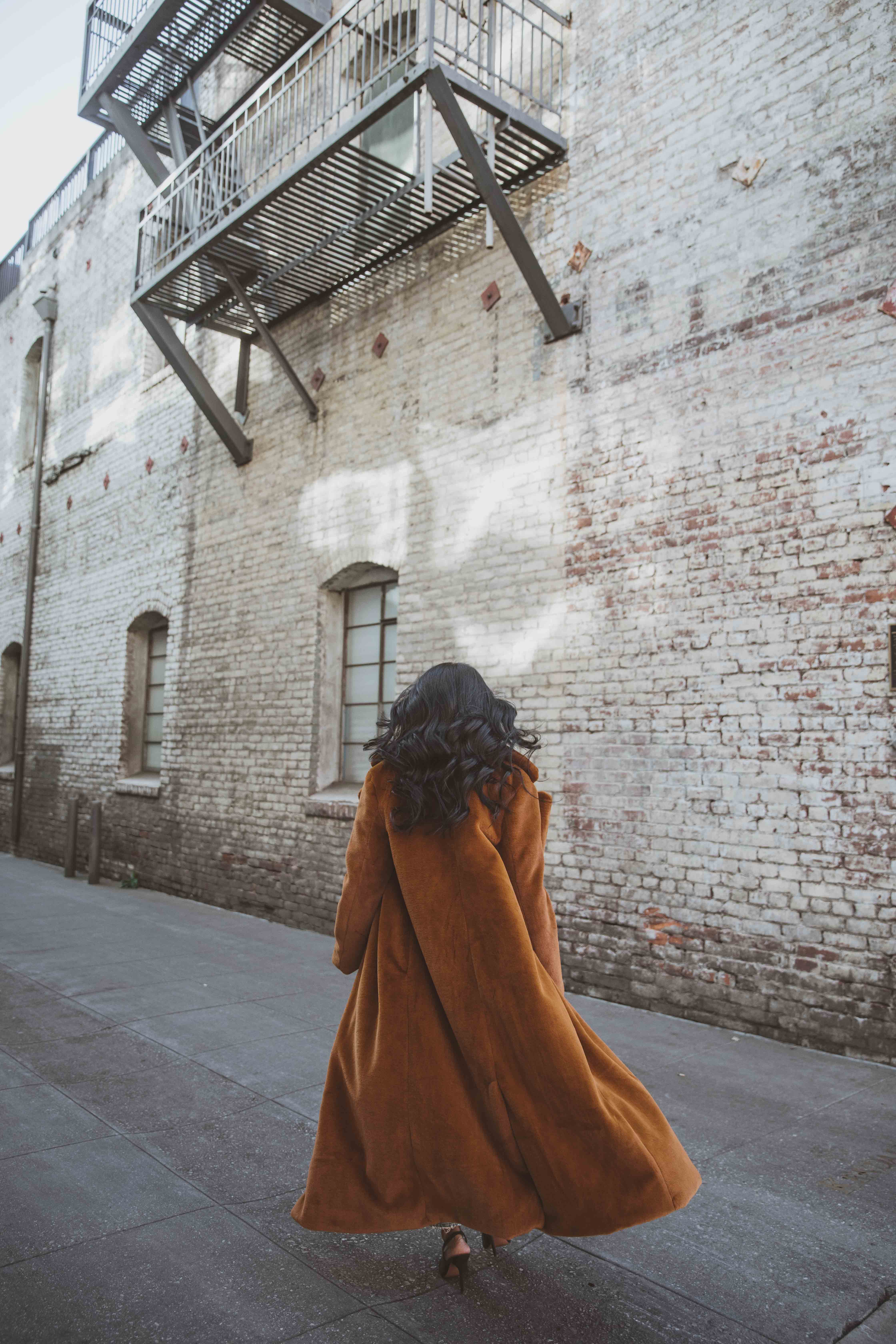 Sheryl Luke from Walk In Wonderland Wearing Urban Outfitters Long Faux Fur Coat 