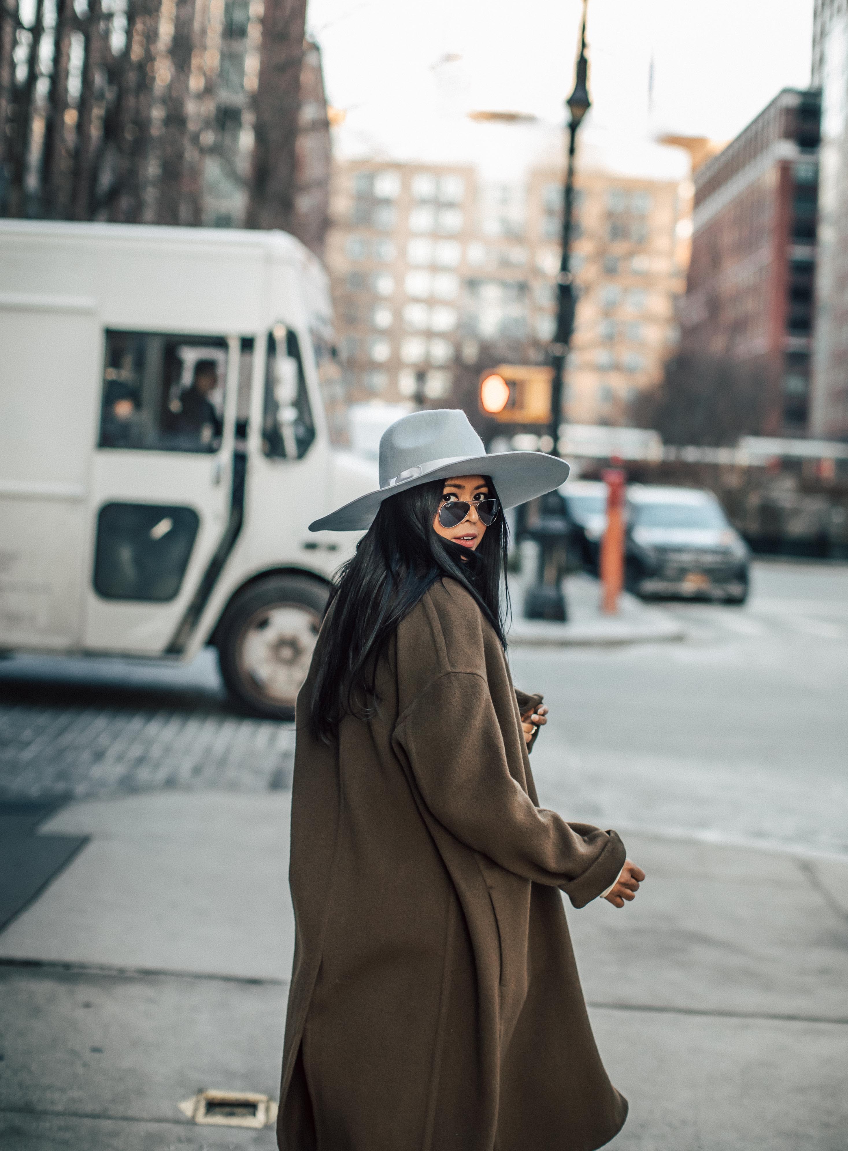 Sheryl Luke Walk In Wonderland wearing Vince Oversize Coat and Zara sock boots