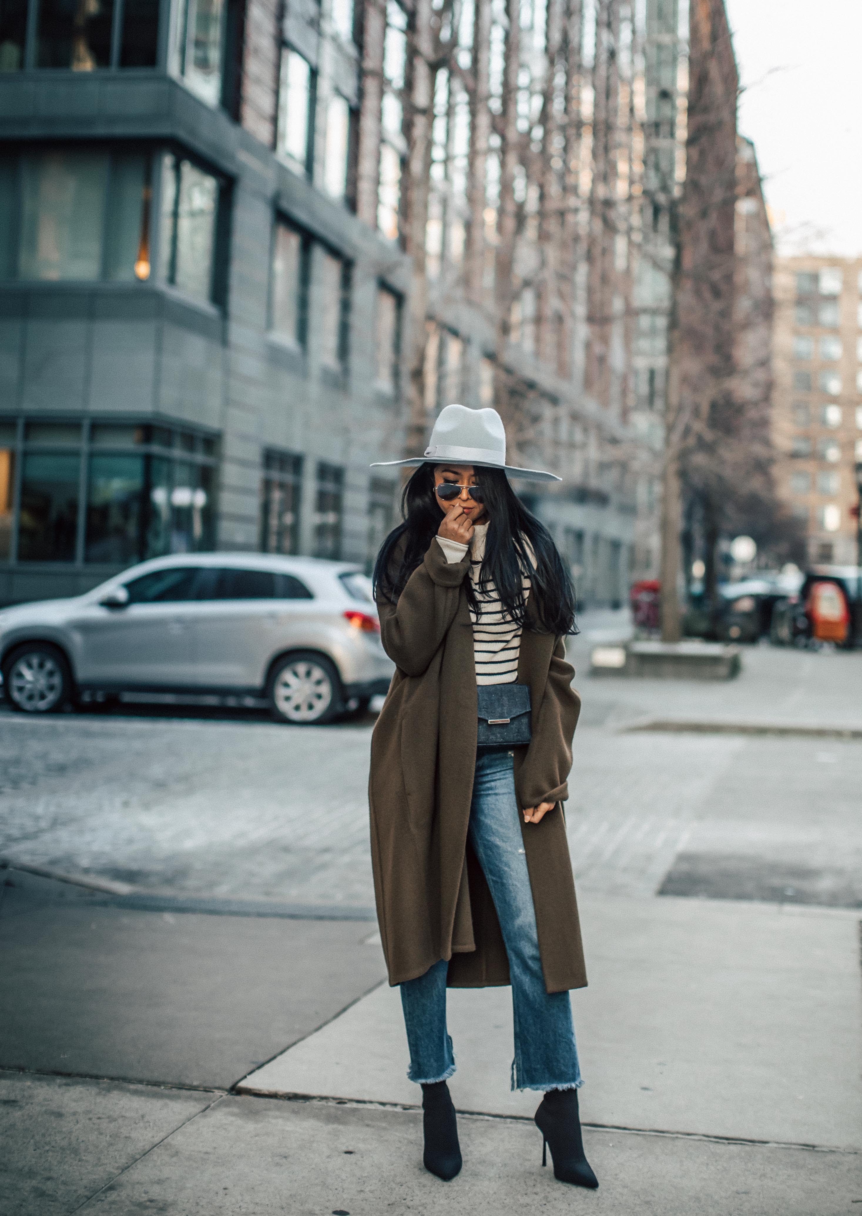 Sheryl Luke Walk In Wonderland wearing Vince Oversize Coat and Zara sock boots