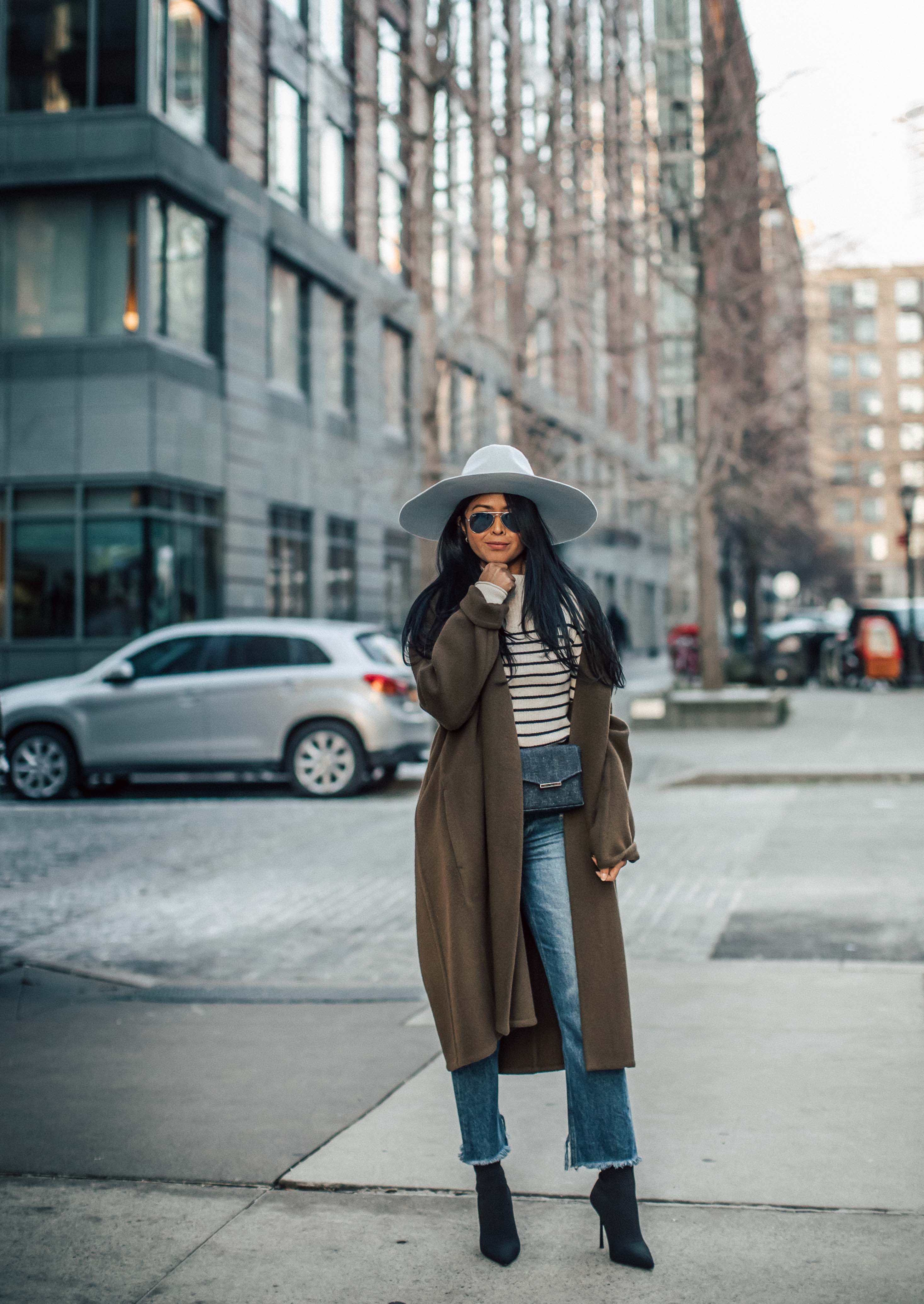 Sheryl Luke Walk In Wonderland wearing Vince Oversize Coat and Zara sock boots