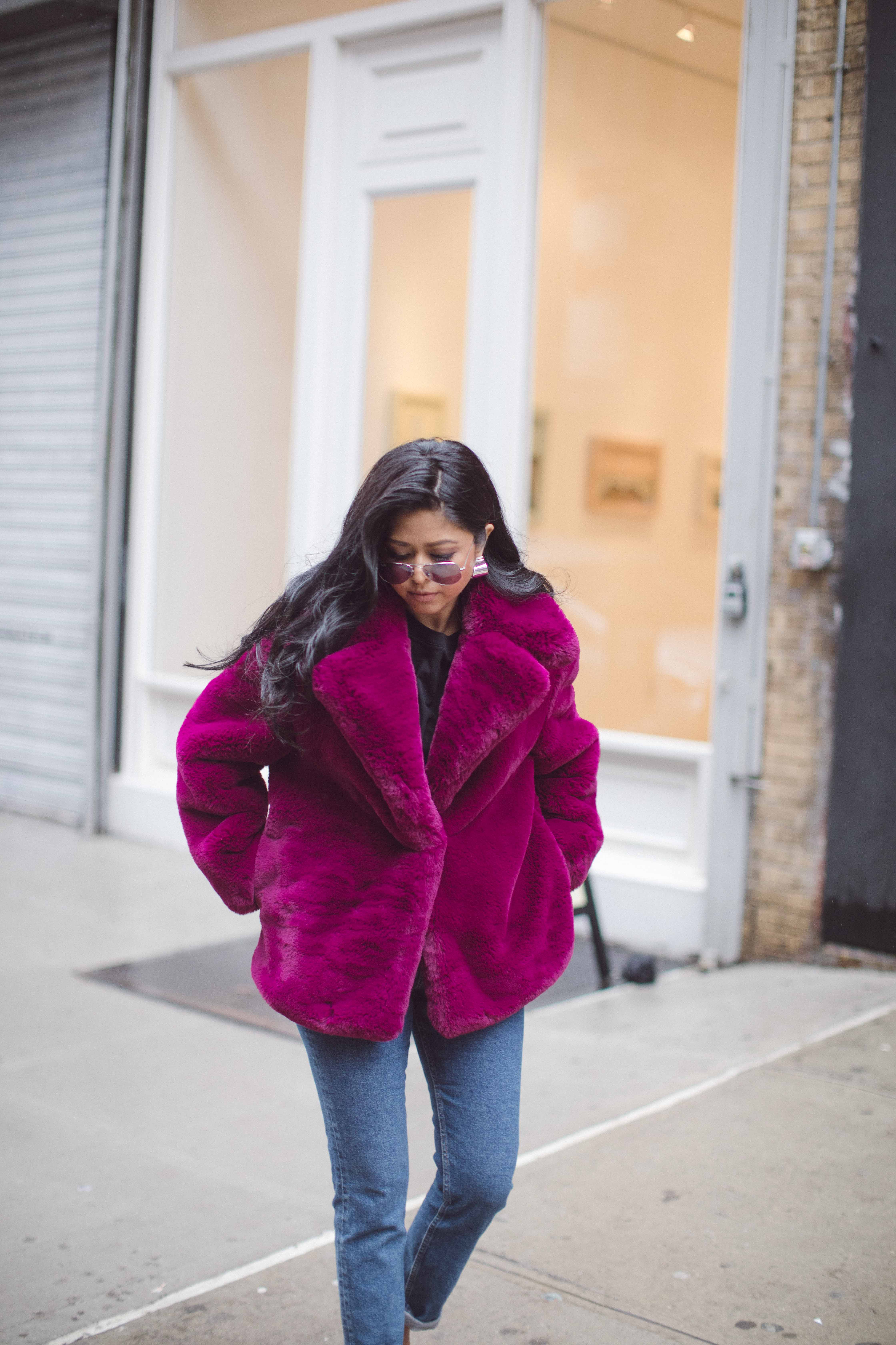 Sheryl Luke of Walk In Wonderland wearing Mango Purple Faux Fur Coat in NYC